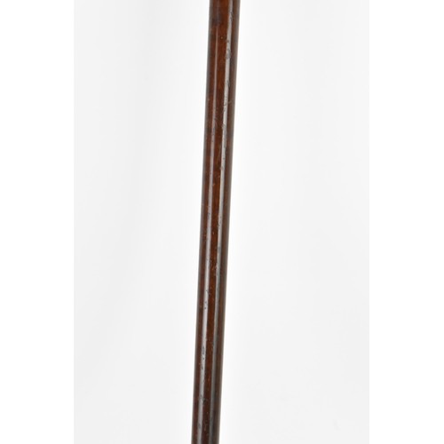 243 - An early 20th century gold plated handled walking stick, the handle of reeded form and stamped G.O.P... 