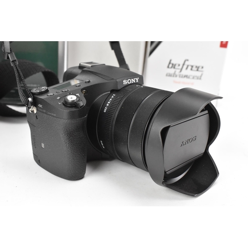 265 - A Sony Cyber-shot RX10 Mark IV digital camera with camera instructions and accessories, together a L... 