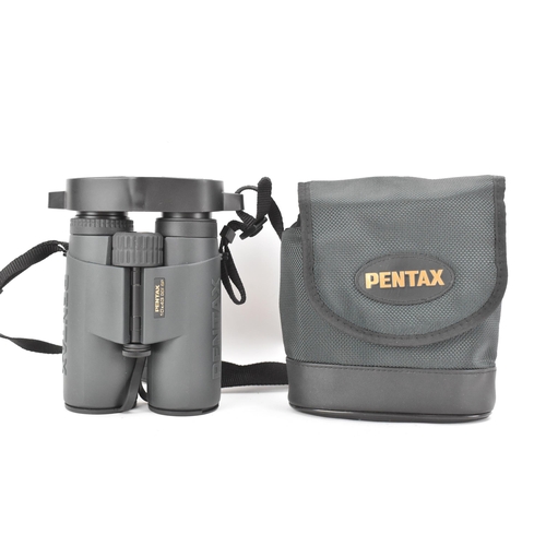 266 - A pair of Pentax Phase Coating 10 x 43 DCF SP Series Binoculars, with case
If there is no condition ... 