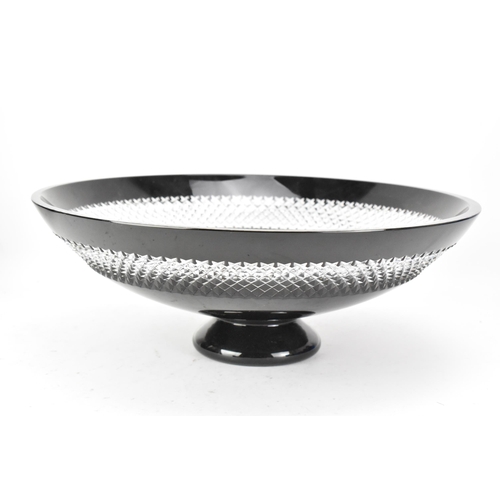 27 - A Waterford black lead crystal cut pedestal bowl designed by John Rocha, raised on a turned foot and... 