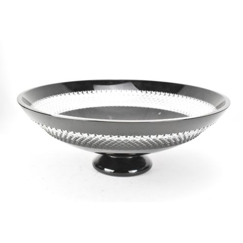 27 - A Waterford black lead crystal cut pedestal bowl designed by John Rocha, raised on a turned foot and... 