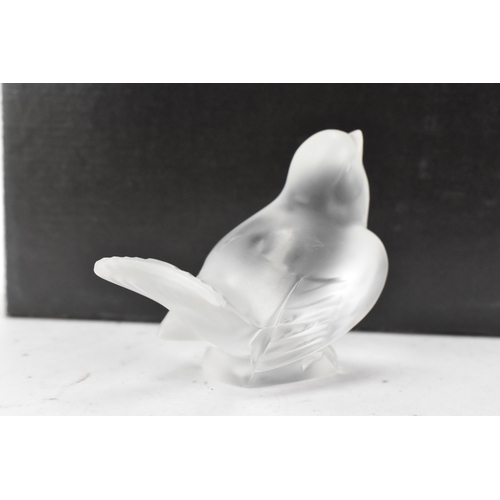 34 - A Lalique 'Moineau Moqueur' frosted glass paperweight fashioned as sparrow, signed 'Lalique France' ... 