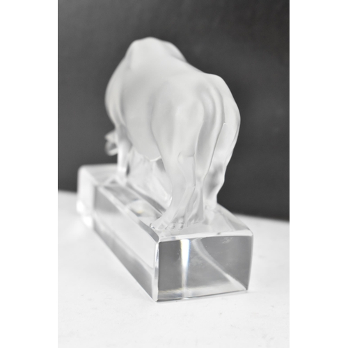 35 - A Lalique frosted glass paperweight fashioned as bull raised on a base, signed 'Lalique France' to t... 