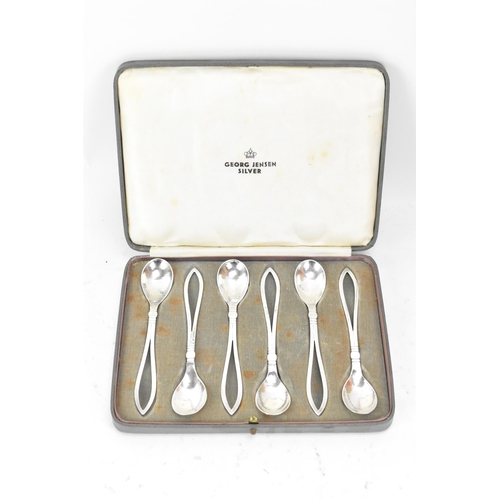 47 - A set of six Georg Jensen 925 silver teaspoons, import marks for London 1931, each having pierced lo... 