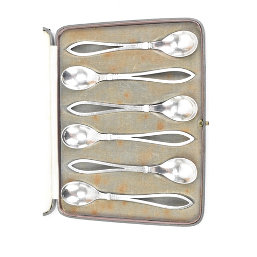 47 - A set of six Georg Jensen 925 silver teaspoons, import marks for London 1931, each having pierced lo... 