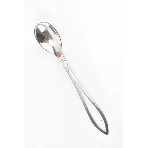 47 - A set of six Georg Jensen 925 silver teaspoons, import marks for London 1931, each having pierced lo... 