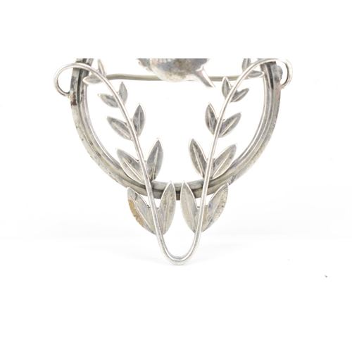 49 - A Georg Jensen Danish sterling silver bird brooch, import marks for London 1952, designed by Arno Ma... 