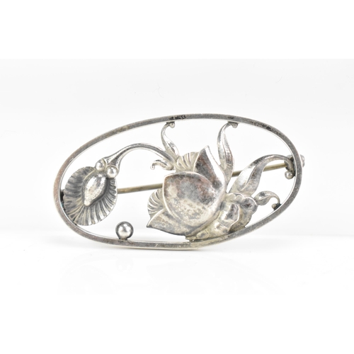 50 - A mid 20th century Georg Jensen Danish sterling oval floral brooch, designed by Gundorph Albertus,  ... 