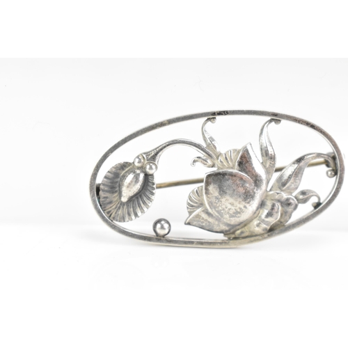 50 - A mid 20th century Georg Jensen Danish sterling oval floral brooch, designed by Gundorph Albertus,  ... 