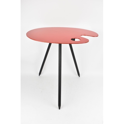 A mid 20th century Bois Manu 'Palette' table, designed by Lucien De Roeck (1915-2002), having a red lacquered top with three lacquered legs, marked to the base, 47.5cm high x 48cm wide
If there is no condition report shown, please request