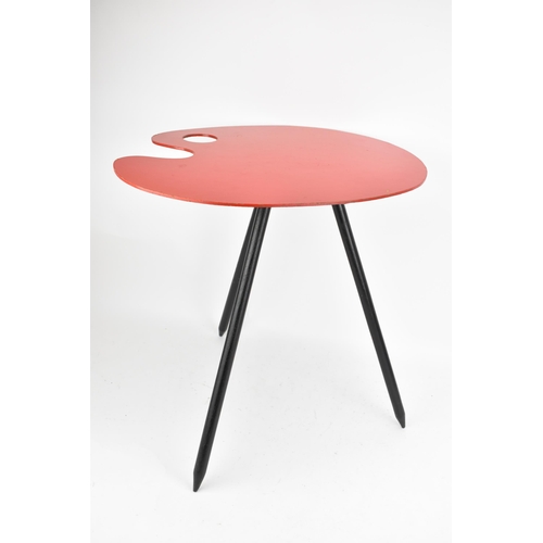 6 - A mid 20th century Bois Manu 'Palette' table, designed by Lucien De Roeck (1915-2002), having a red ... 