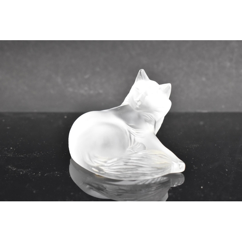 63 - A Lalique frosted glass model 'Happy Cat' with engraved mark 'Lalique, France', 6cm high x 9.2cm wid... 