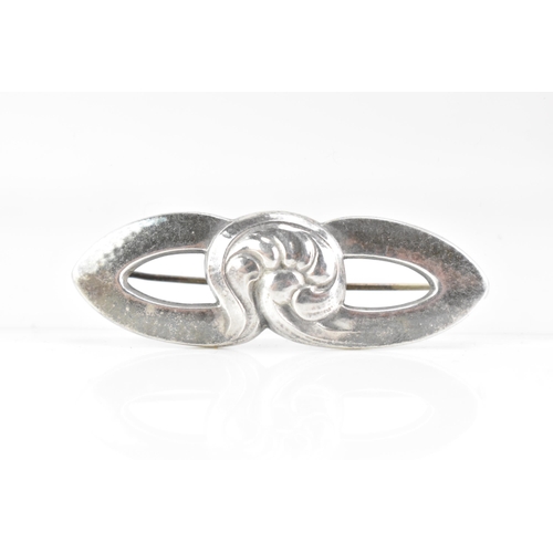 66 - A Georg Jensen Danish sterling brooch, circa 1933-44, model no. 40, in the form of entwined flowers,... 