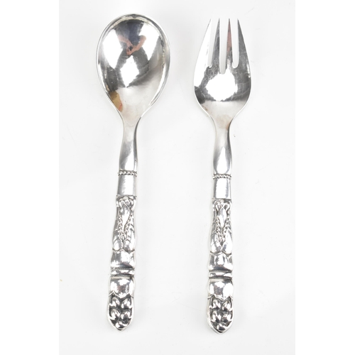 68 - A pair of Georg Jensen Danish sterling silver salad servers, import marks for London 1932, model no.... 