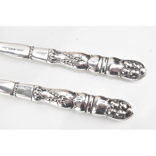 68 - A pair of Georg Jensen Danish sterling silver salad servers, import marks for London 1932, model no.... 