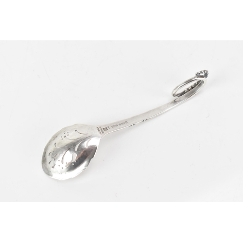 70 - A Georg Jensen Danish sterling silver sifter spoon, import marks for London 1932, model no. 239, hav... 