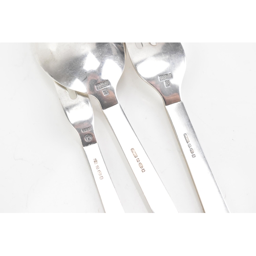 72 - An Art Deco Georg Jensen Danish sterling silver fork, spoon and pickle fork, the fork and spoon havi... 