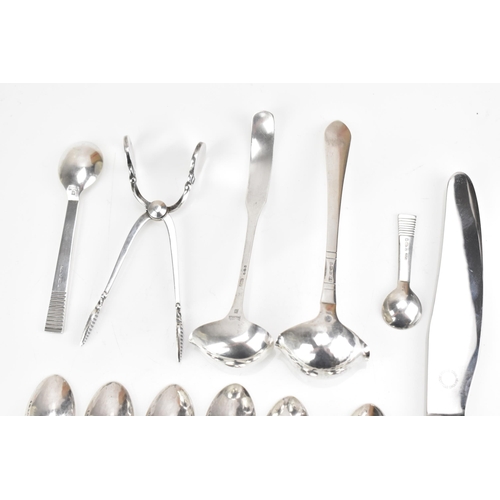 73 - A collection of early/mid 20th century Georg Jensen 925 silver cutlery, having various import marks,... 