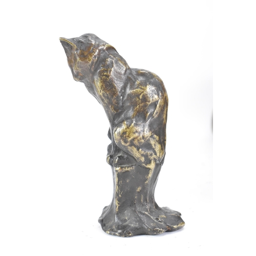 76 - Theophile Alexandre Steinlen (French 1859-1923) A cast bronze sculpture of a seated cat, signed Stei... 