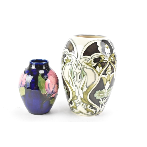 82 - Two Moorcroft pottery vases to include a trial piece 'Burslem Twilight' pattern vase, designed by An... 