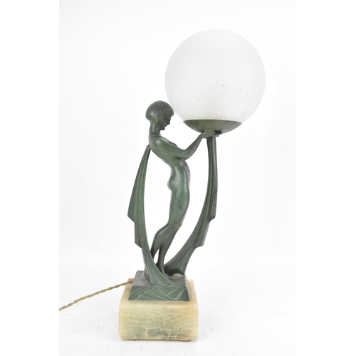 84 - After Limousin, a French Art Deco patinated spelter figural table lamp, in the form of a naked scarf... 