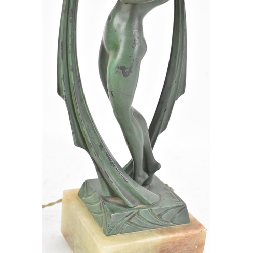 84 - After Limousin, a French Art Deco patinated spelter figural table lamp, in the form of a naked scarf... 