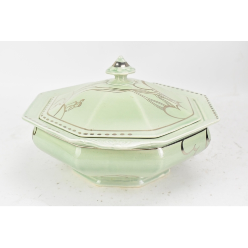 87 - An Art Deco Clarice Cliff Bizarre tureen, of octagonal form, hand painted in silver lustre over a gr... 