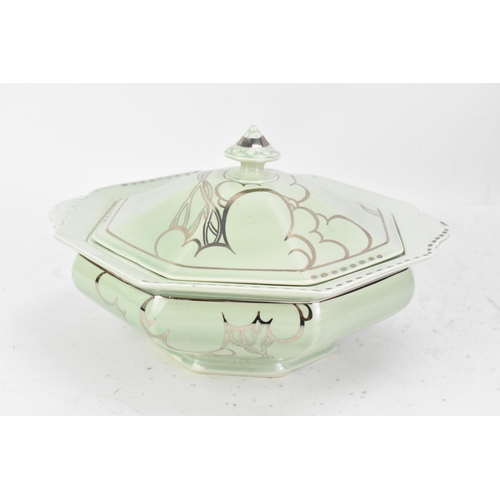 87 - An Art Deco Clarice Cliff Bizarre tureen, of octagonal form, hand painted in silver lustre over a gr... 