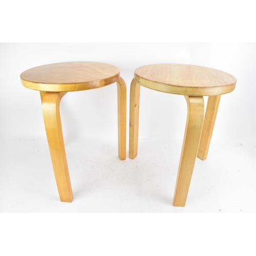 91 - Alvar Aalto (1898-1976) for Finmar Ltd- pair of Beech ply and bentwood stacking stools of circular f... 