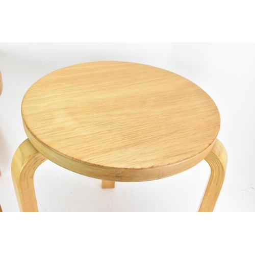 91 - Alvar Aalto (1898-1976) for Finmar Ltd- pair of Beech ply and bentwood stacking stools of circular f... 