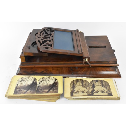 173 - A Victorian mahogany stereoscopic viewer, together with a collection of stereoscopic cards, the fold... 