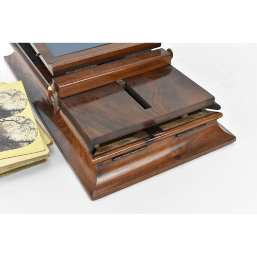 173 - A Victorian mahogany stereoscopic viewer, together with a collection of stereoscopic cards, the fold... 