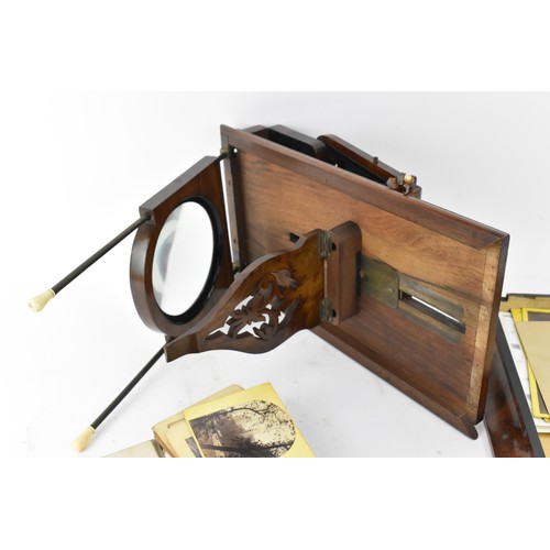 173 - A Victorian mahogany stereoscopic viewer, together with a collection of stereoscopic cards, the fold... 