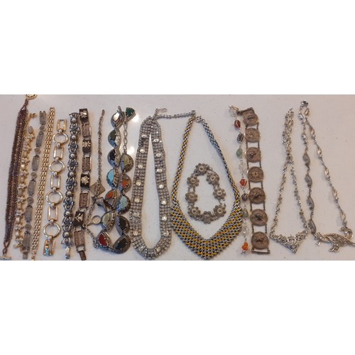 72 - Vintage fine bead necklaces to include a red bead multi chain example, a tiger's eye example and 2 w... 