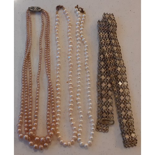 72 - Vintage fine bead necklaces to include a red bead multi chain example, a tiger's eye example and 2 w... 