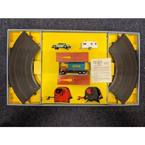 71 - A boxed Minic Holiday Highway miniaturized, high speed motorway adventure
Location:LAF
If there is n... 