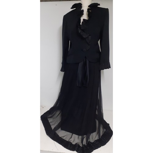 52 - Hartnell, British Designer- A black evening jacket with ruffled collar and cuffs approx 38