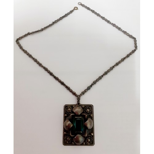 107 - A vintage silver necklace having a square formed pendant with central green glass stone. Location:CA... 