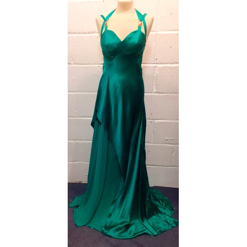 Versace- A 'Versace Collection' green silk 'Abito Donna Tessuto' evening gown with gold tone detail to the shoulder straps and trailing hem with waterfall skirt, European size 40, unworn with original tags.
Location:Rail
Condition:Unworn with original tags, requires pressing.