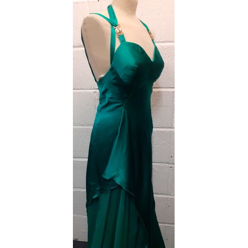 6 - Versace- A 'Versace Collection' green silk 'Abito Donna Tessuto' evening gown with gold tone detail ... 