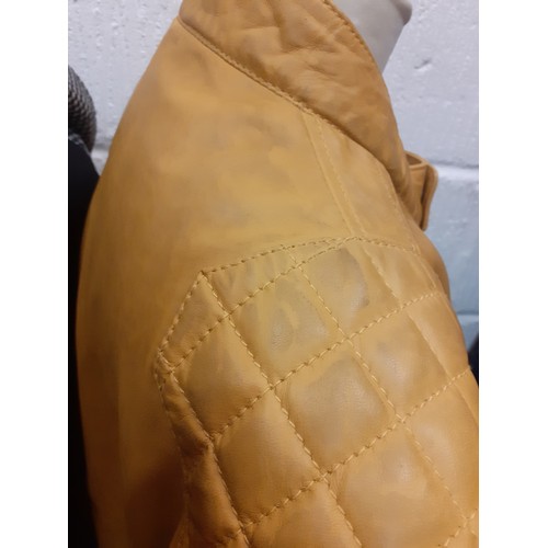 111 - Joe Brown- A mustard yellow biker style leather effect jacket, size large together with a James Lake... 