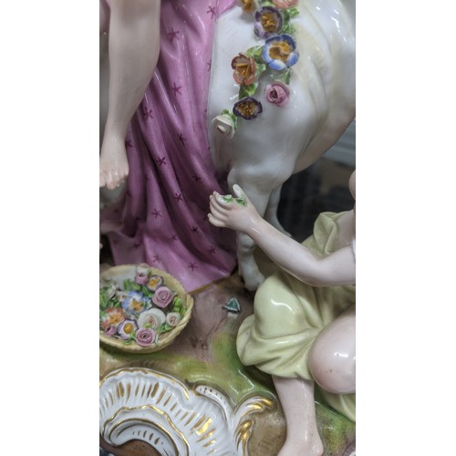 179 - A late 19th century Meissen porcelain figure of Europa and the Bull, accompanied by two kneeling nym... 