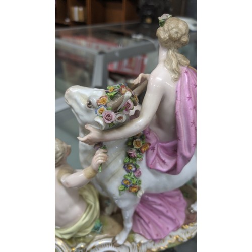 179 - A late 19th century Meissen porcelain figure of Europa and the Bull, accompanied by two kneeling nym... 