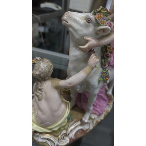 179 - A late 19th century Meissen porcelain figure of Europa and the Bull, accompanied by two kneeling nym... 