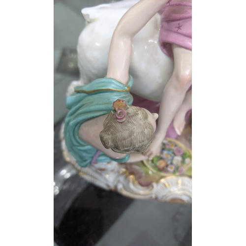 179 - A late 19th century Meissen porcelain figure of Europa and the Bull, accompanied by two kneeling nym... 