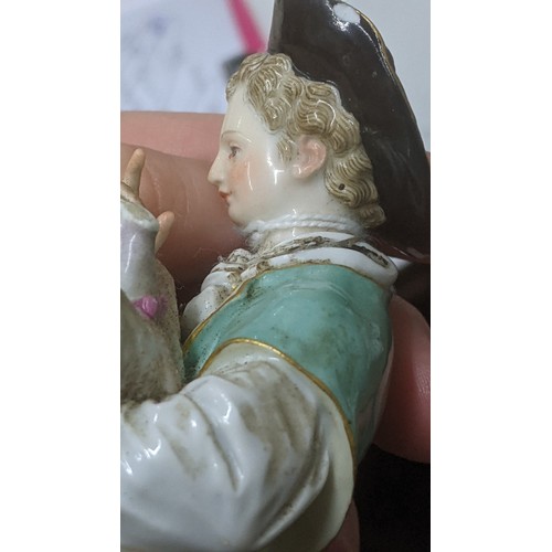 241 - A late 19th century Meissen figure group of a shepherd and lamb, after an original by Acier, the she... 