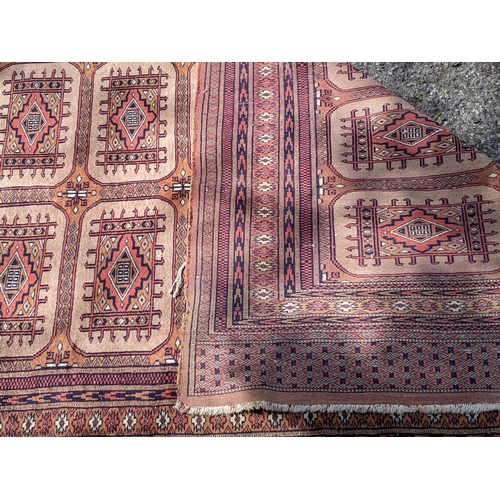 102 - Two Pakistan Bokhara rugs largest 188cms & 121cms and a geometric wool rug
Location: STAIRS
If there... 