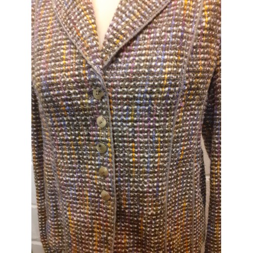 13 - Feraud- A vintage 2 piece boucle/tweed skirt suit having a lilac lining, European size 40 together w... 