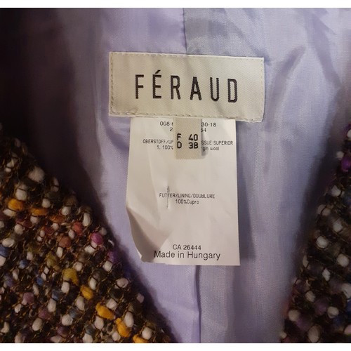 13 - Feraud- A vintage 2 piece boucle/tweed skirt suit having a lilac lining, European size 40 together w... 