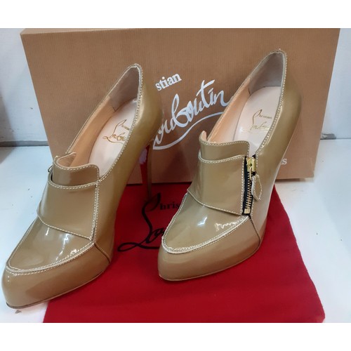 8 - Christian Laboutin-A pair of unworn taupe Lapono patent stilettos having a 5